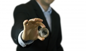 businessmanholdingcrystalglobe.jpg